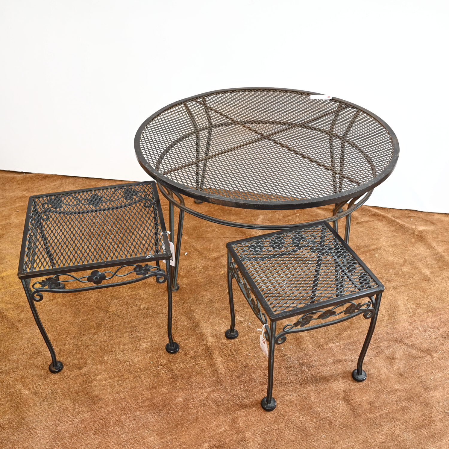 Appraisal: WROUGHT IRON PATIO TABLE GROUP th c incl a modern