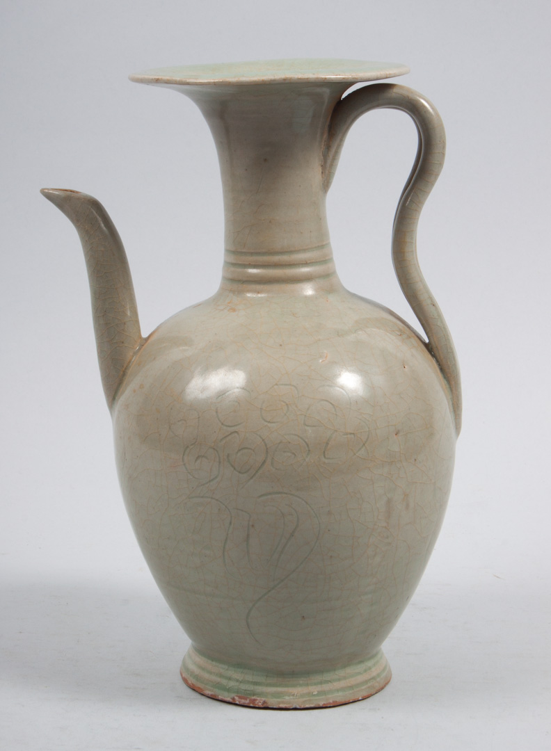 Appraisal: Chinese celadon porcelain wine ewer with incised decoration in H