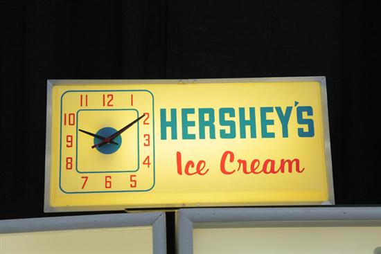 Appraisal: HERSHEY'S ICE CREAM ADVERTISING SIGN Illuminated sign with clock ''h