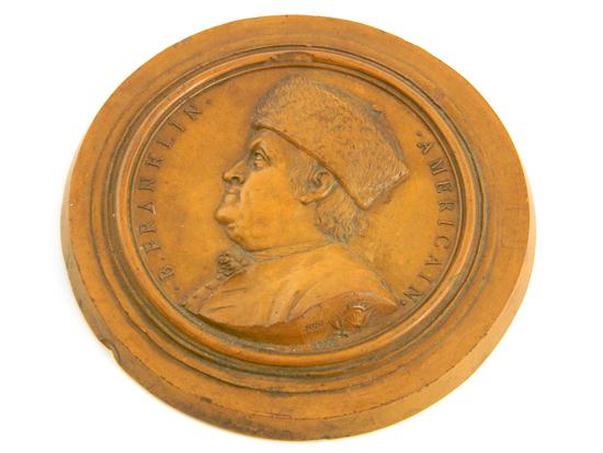 Appraisal: Giovanni Battista Nini Italian - terracotta portrait medallion of Benjamin