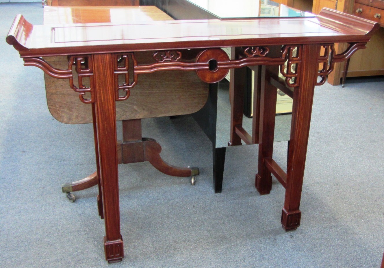 Appraisal: A th century Chinese hardwood altar table with pierced and