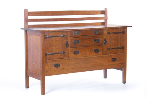 Appraisal: GUSTAV STICKLEY Sideboard with three central drawers flanked by two