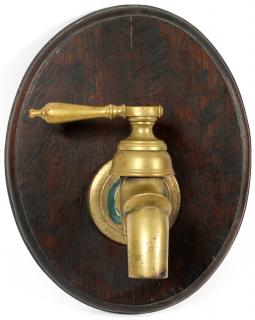 Appraisal: BRASS SPIGOT ON A WOODEN PLAQUE BRASS SPIGOT ON A