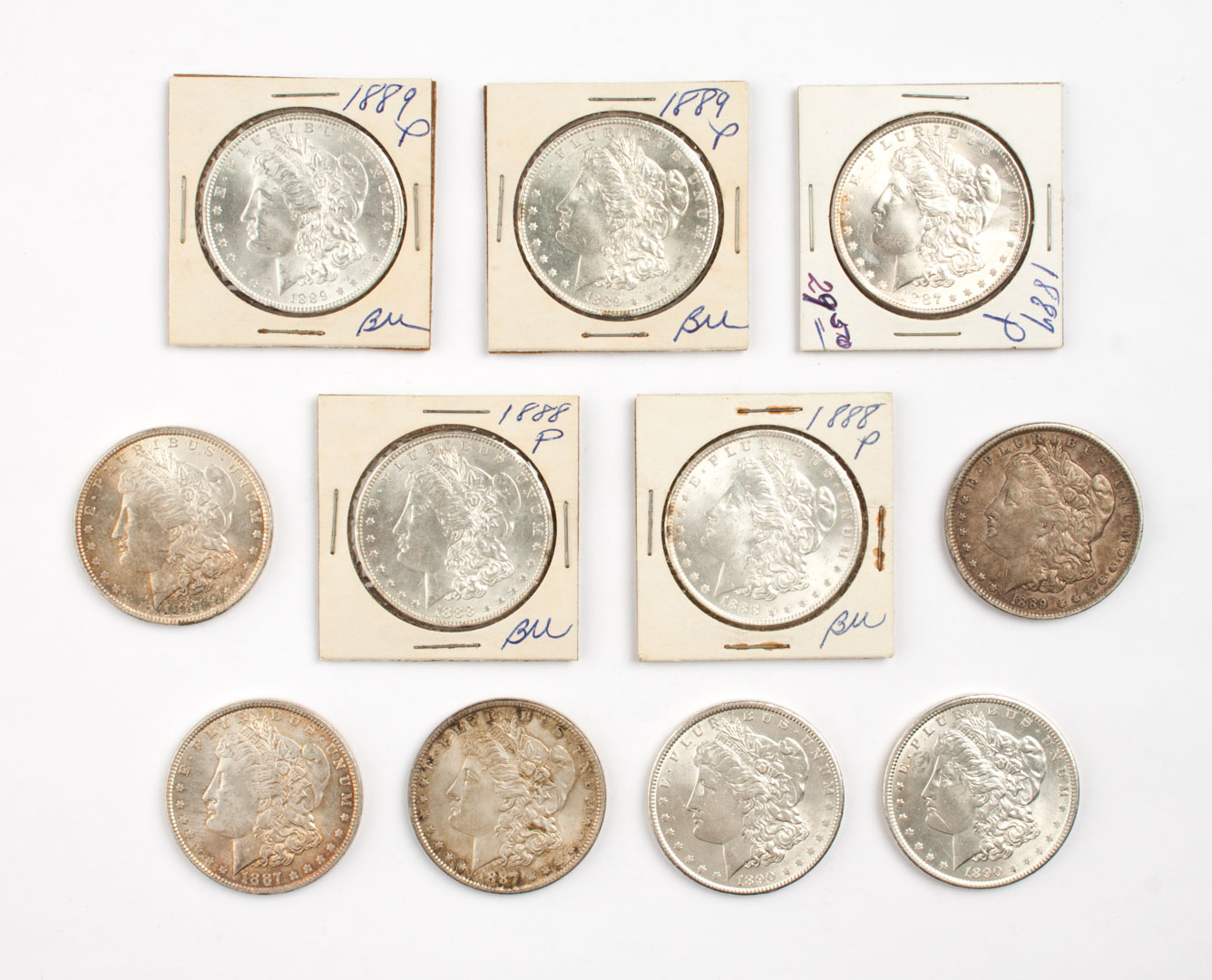 Appraisal: Eleven U S Morgan type silver dollars - comprising three