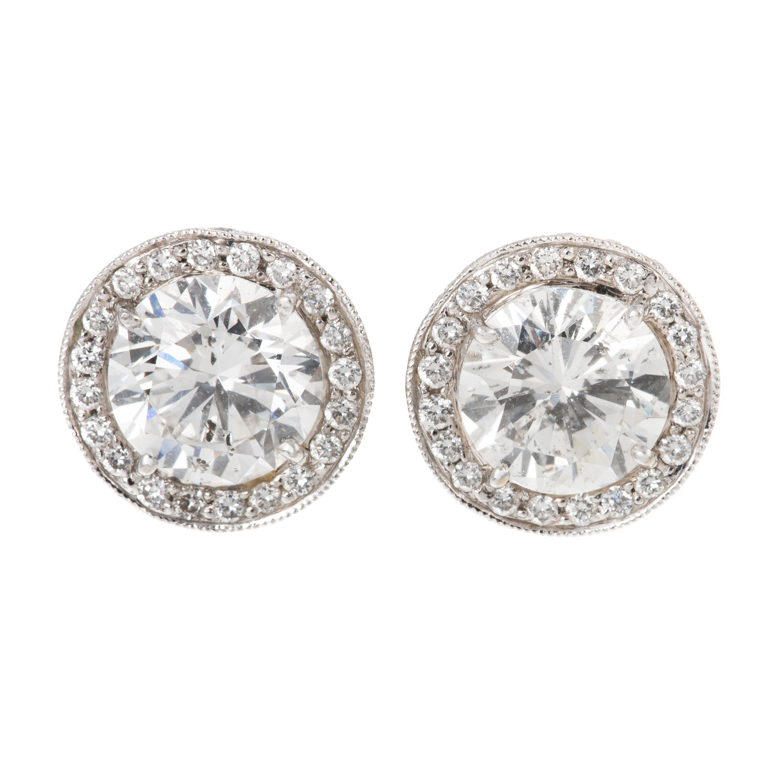 Appraisal: A PAIR OF CTW DIAMOND HALO STUDS IN K K