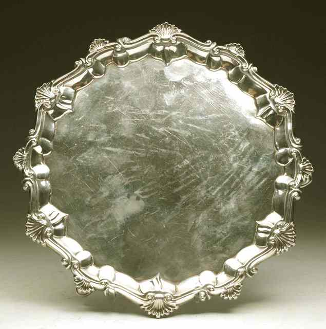 Appraisal: A GEORGE III SILVER SALVER with a shell and scroll