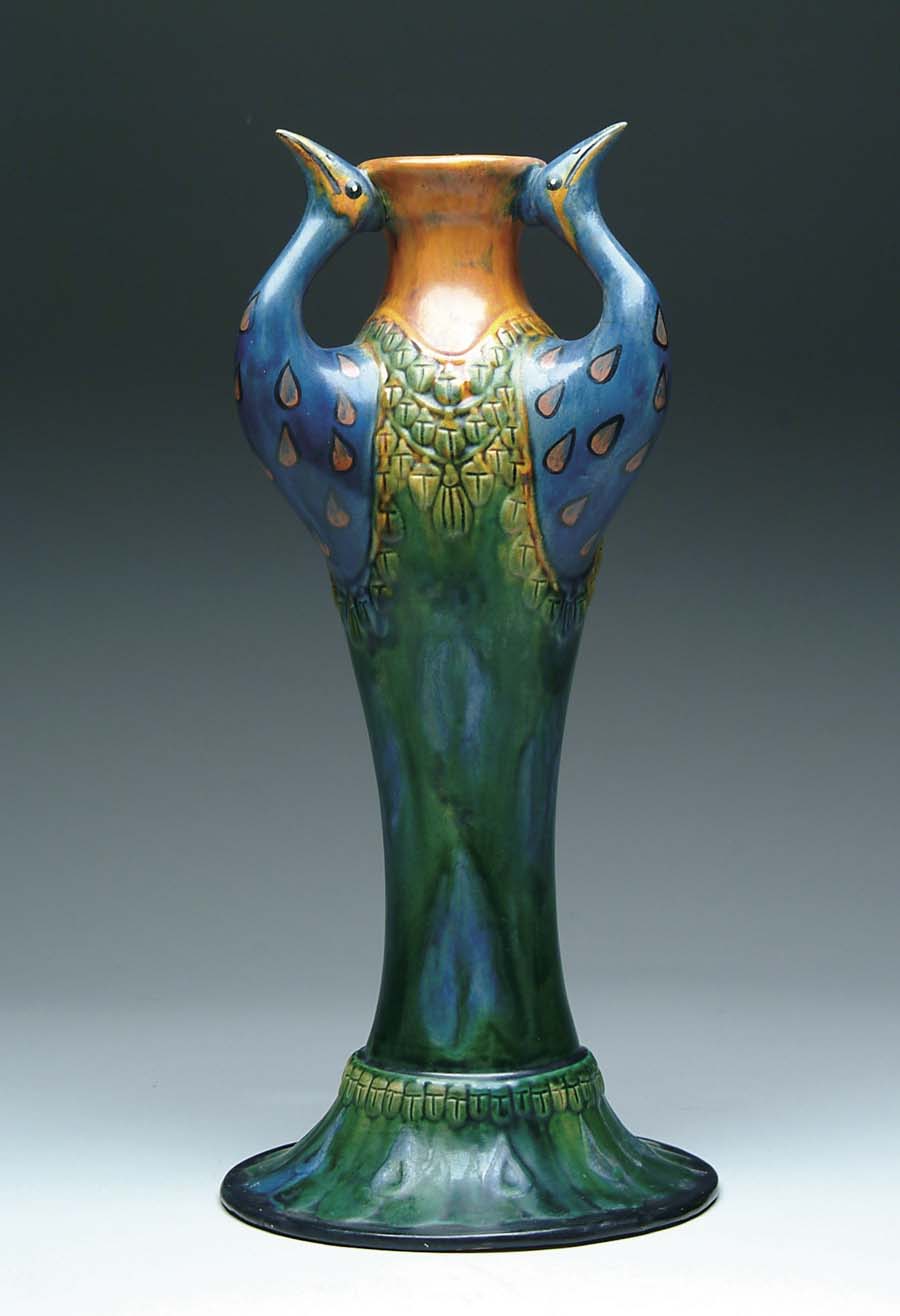 Appraisal: PEACOCK VASE Wonderful pottery vase has three handles in the