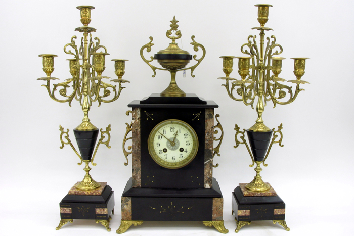 Appraisal: THREE PIECE AMERICAN CLOCK SET c The center clock with