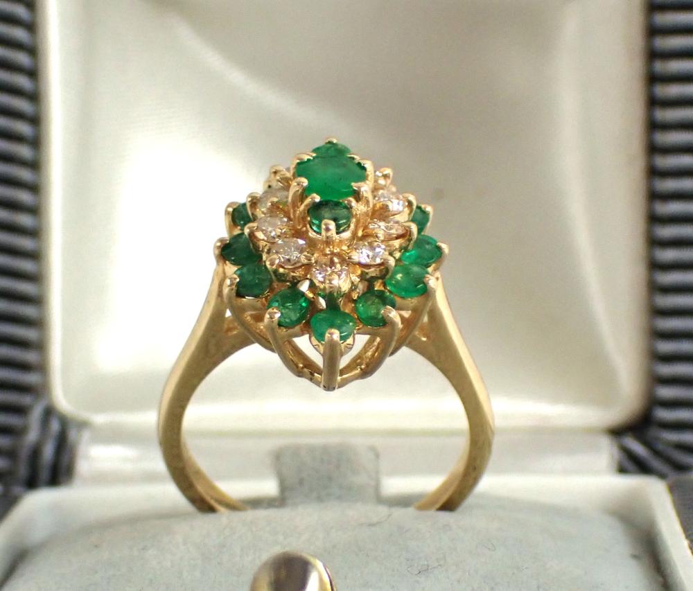 Appraisal: EMERALD DIAMOND AND FOURTEEN KARAT GOLD RING with twelve round-cut