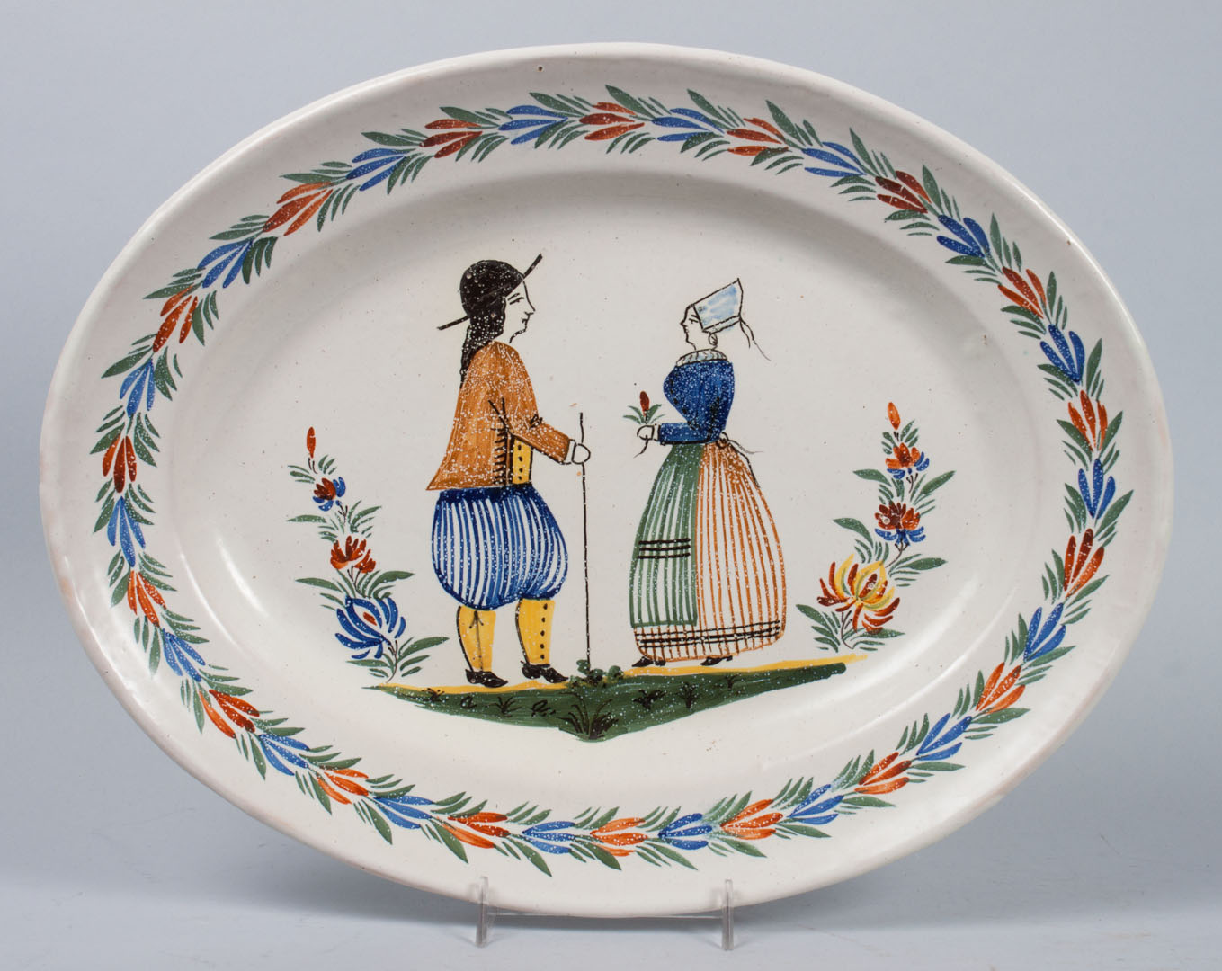 Appraisal: Hubaudiere Quimper platter late th century with peasant and foliate