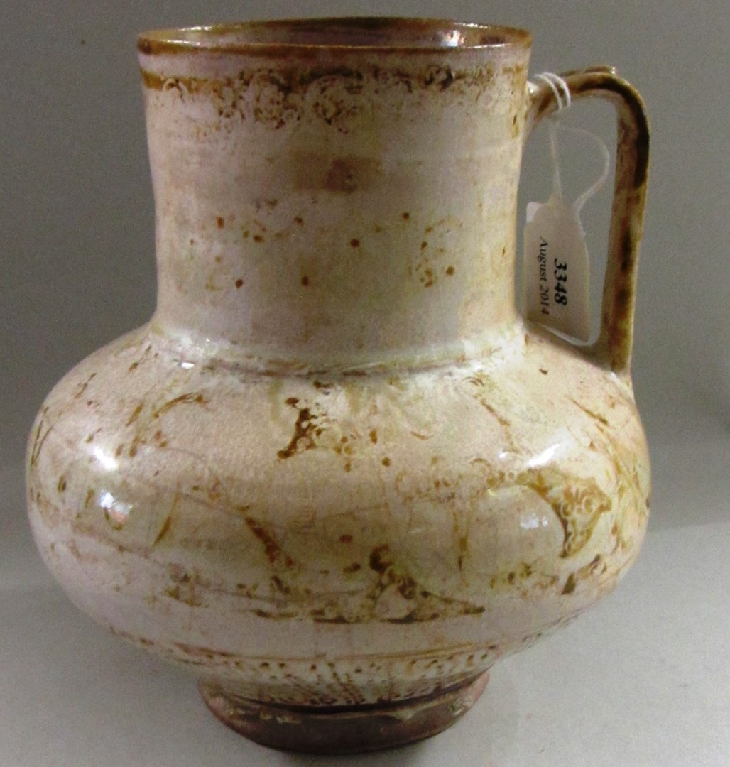 Appraisal: An intact Kashan lustre pottery jug Central Iran th th