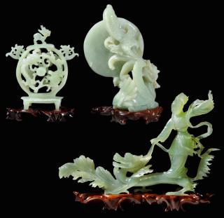 Appraisal: Three Green Hardstone Carvings on Finely Carved Wood Stands Chinese