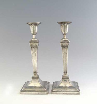 Appraisal: bright-engraved Neoclassical candlesticks on rising square bases fine bead borders