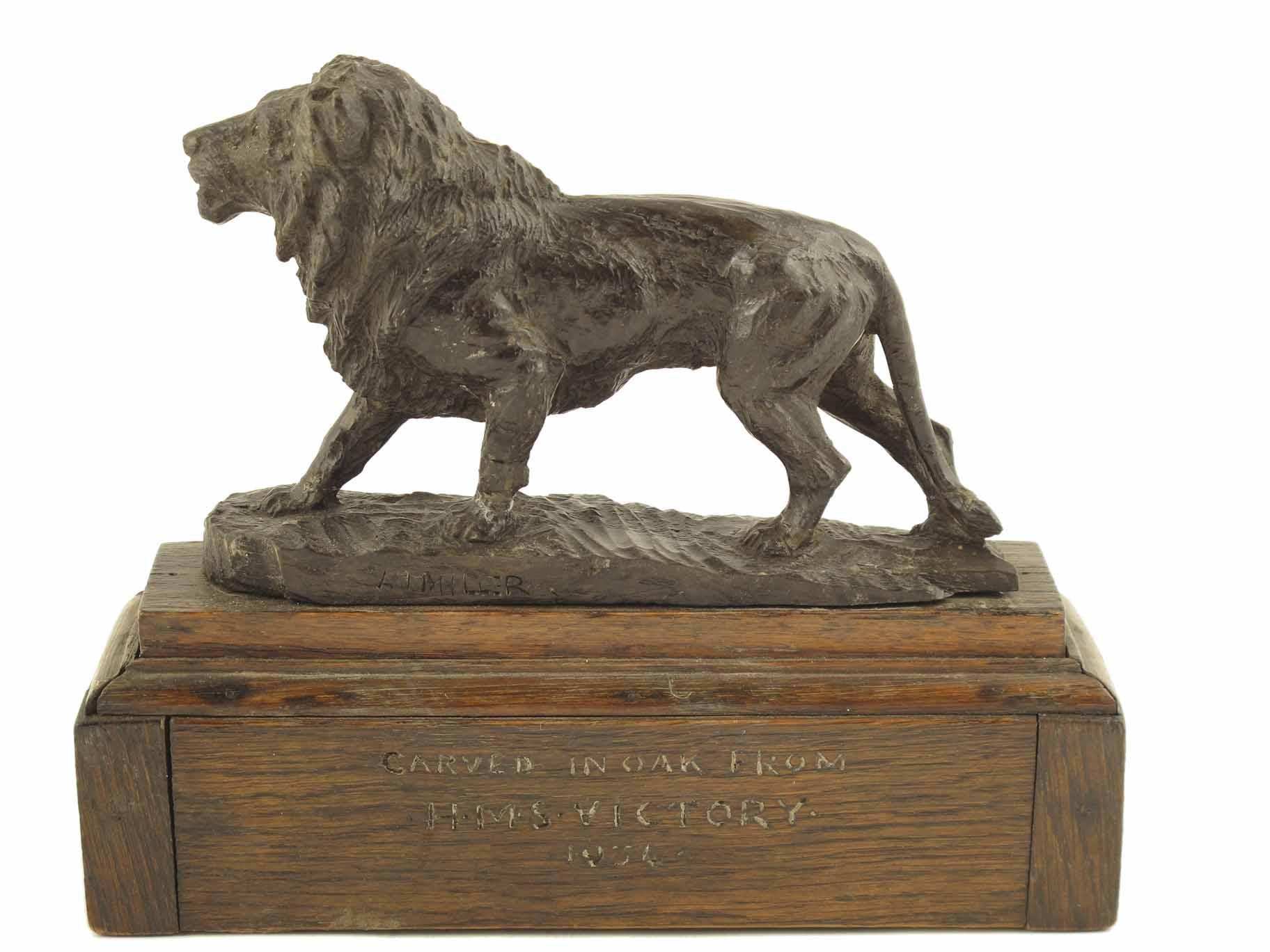 Appraisal: A J Miller Carved oak standing lion