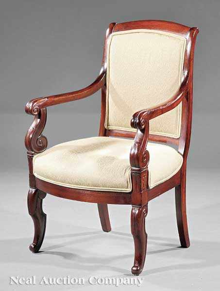 Appraisal: An American Classical Carved Mahogany Armchair early th c shaped