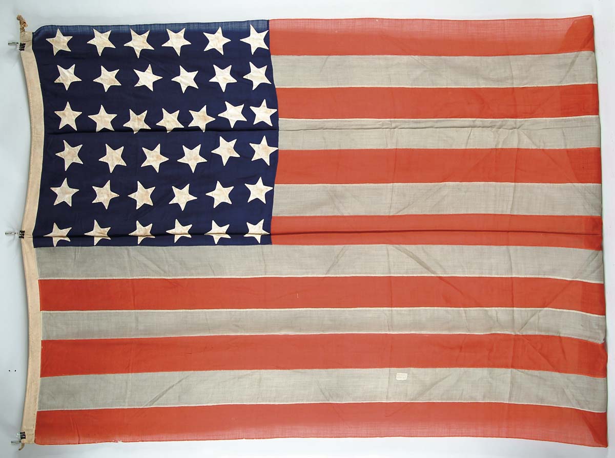 Appraisal: -STAR AMERICAN FLAG x wool bunting flag with rope hoist