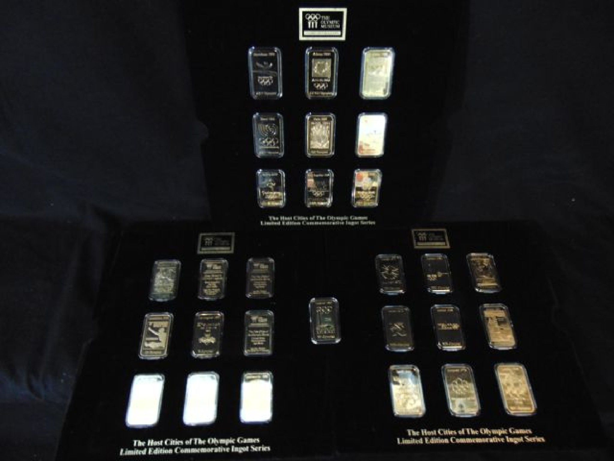 Appraisal: The Host Cities of The Olympic Games Twenty-Eight Commemorative Ingots