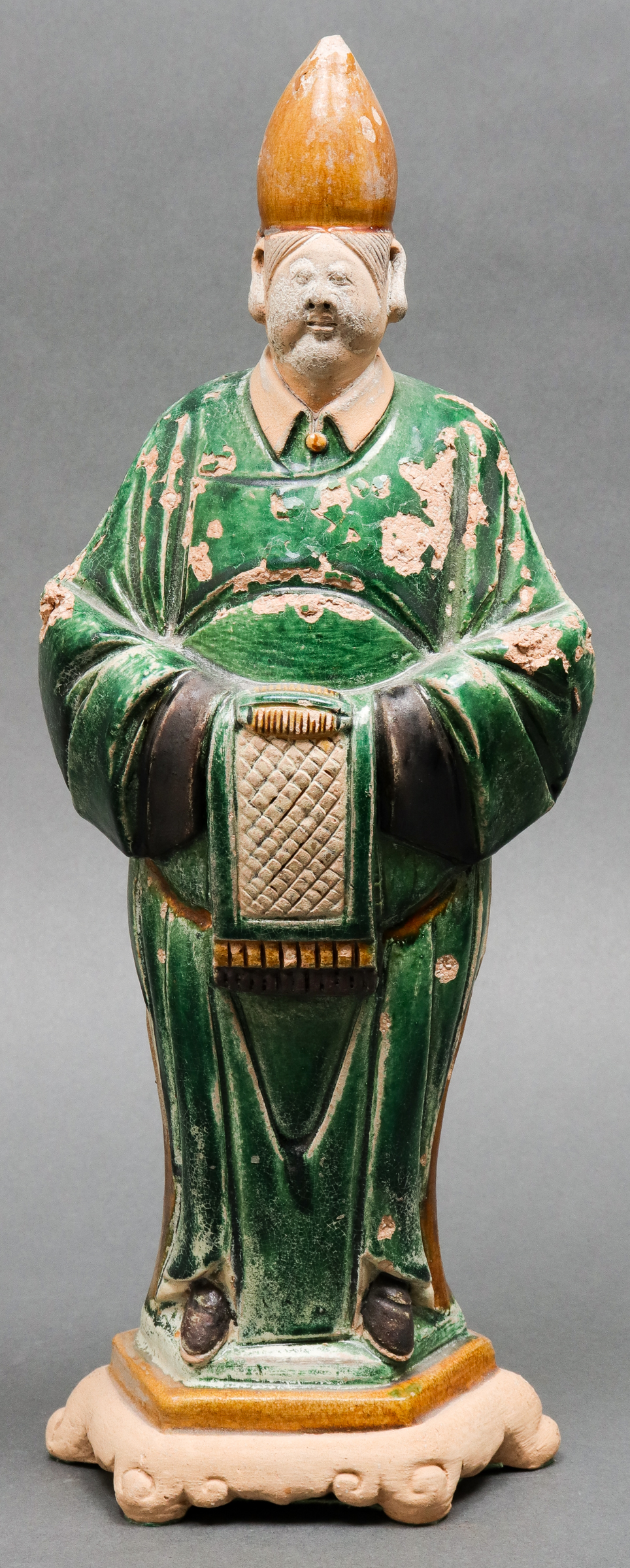 Appraisal: CHINESE MING DYNASTY SANCAI POTTERY ATTENDANT Chinese Ming Dynasty -