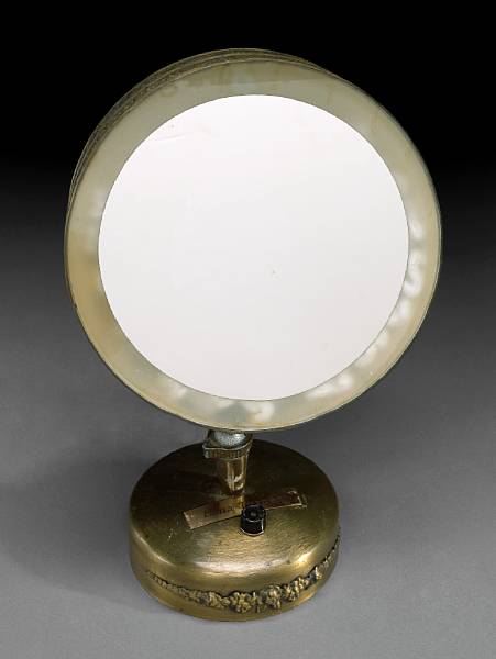 Appraisal: A Lana Turner electric make-up mirror s Made of brass