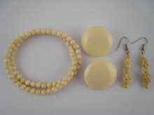 Appraisal: An ivory bead necklace approx cm long together with a