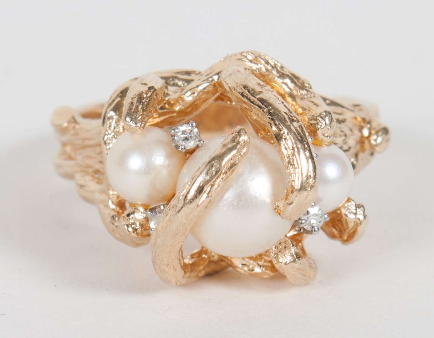 Appraisal: Lady's K gold and pearl ring with four small diamonds