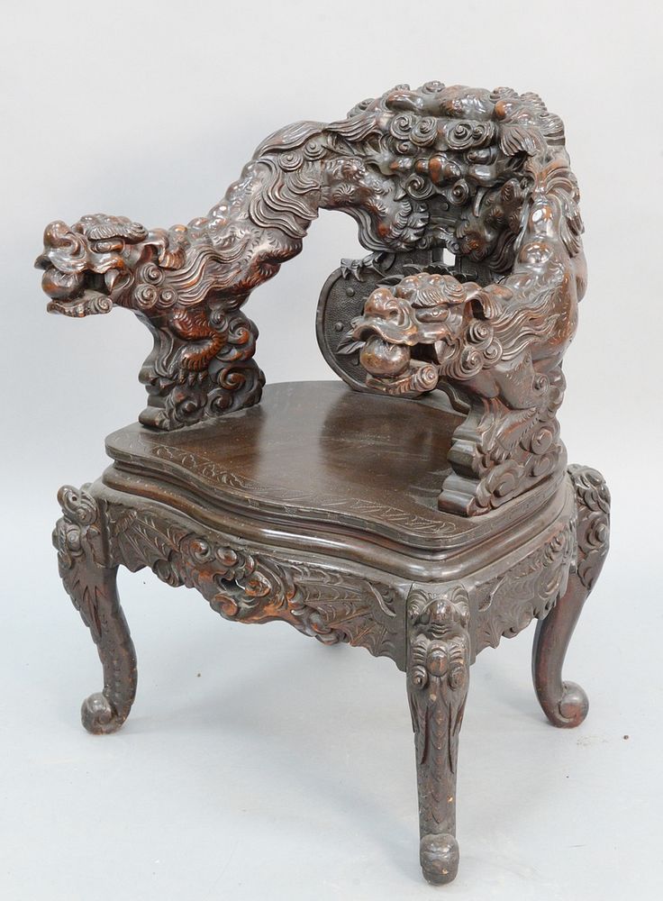 Appraisal: Chinese armchair with carved dragon head ht wd Chinese armchair