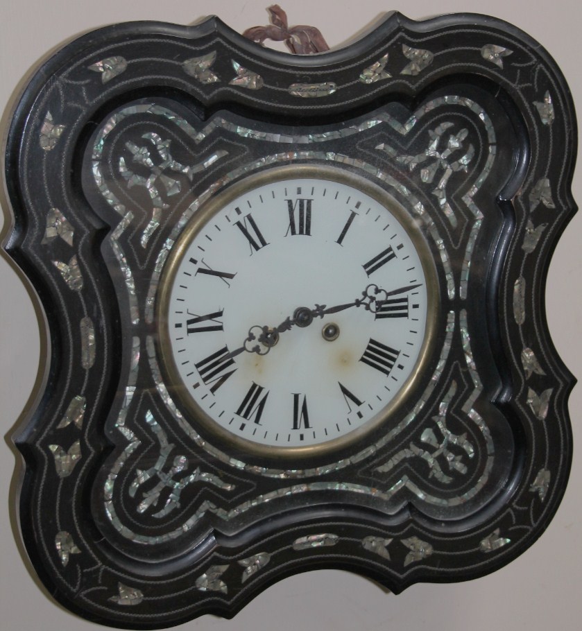 Appraisal: A thC ebonised and mother of pearl wall clock the