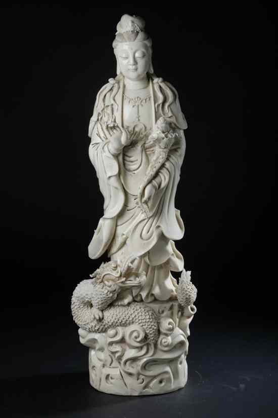 Appraisal: LARGE CHINESE BLANC-DE-CHINE PORCELAIN FIGURE OF GUANYIN AND DRAGON Impressed