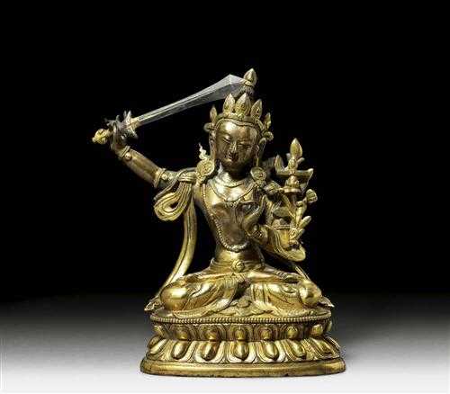 Appraisal: MANJUSHRI Sino-Tibetan th century H cm Gilt bronze the skin