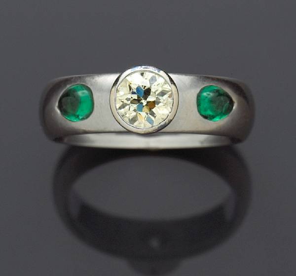 Appraisal: A diamond and emerald ring old European-cut diamond weighing approximately