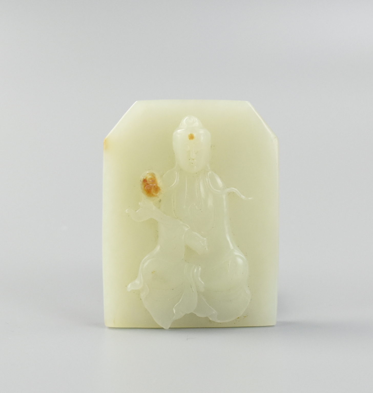 Appraisal: CHINESE WHITE JADE CARVING OF GUANYIN PENDANT a square shaped