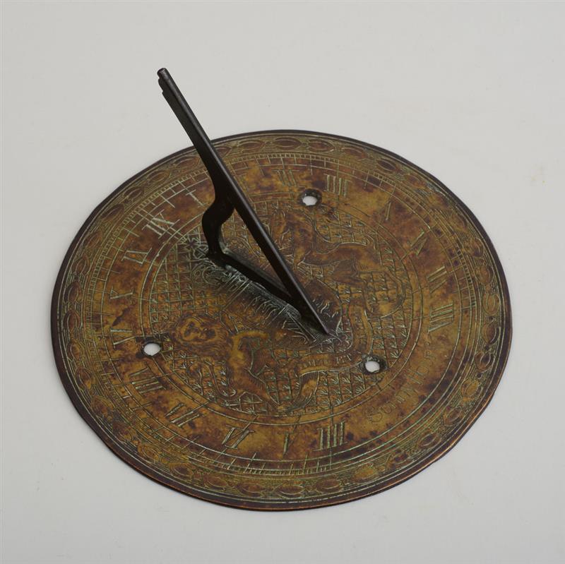 Appraisal: ENGLISH BRASS SUNDIAL Decorated with lion and unicorn inscribed Dieu