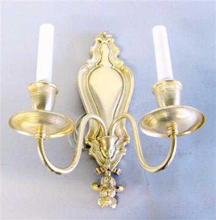 Appraisal: Set of four silvered metal two-arm wall lights e f