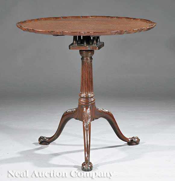 Appraisal: An English or Irish George III Mahogany Tea Table mid-