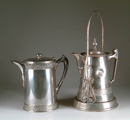 Appraisal: TWO ICE WATER PITCHERS pitcher in tipping stand marked American