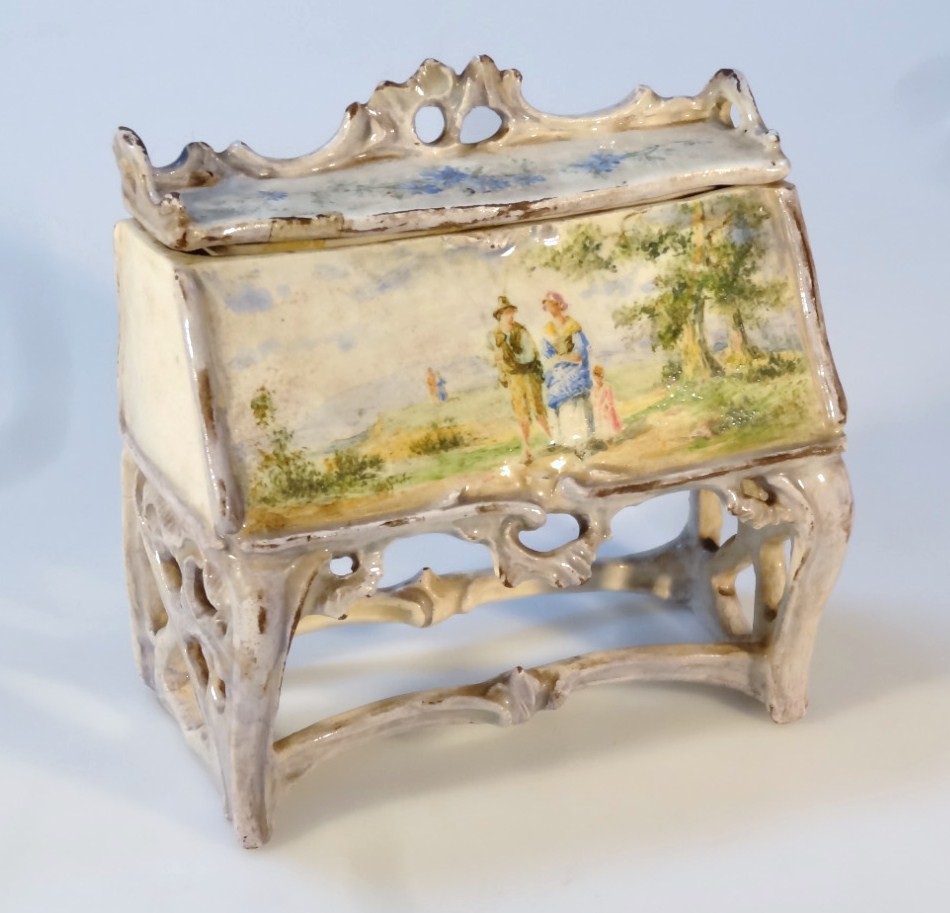 Appraisal: A Continental earthenware figure of a bureau with removable lid