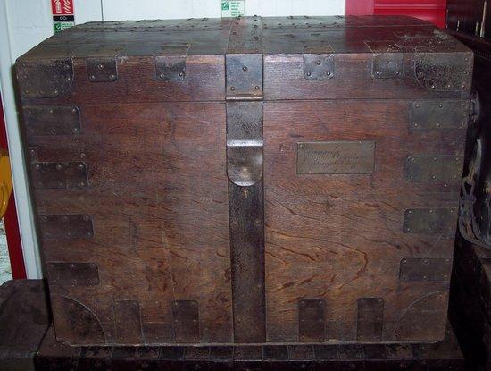 Appraisal: A metal bound silver chest with handles to the sides