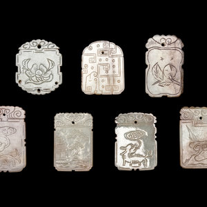 Appraisal: Seven Chinese Celadon Jade Carved Plaques three carved with mythical