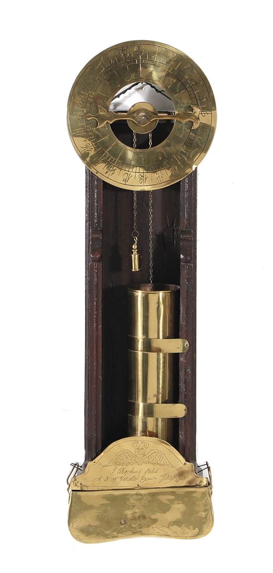 Appraisal: Brass and wood water clock Chapman H W D Provenance