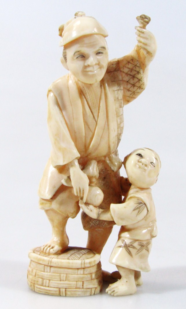 Appraisal: An early thC Japanese ivory okimono figure formed as gentleman