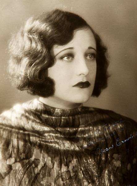 Appraisal: A Joan Crawford signed black and white photograph by Ruth