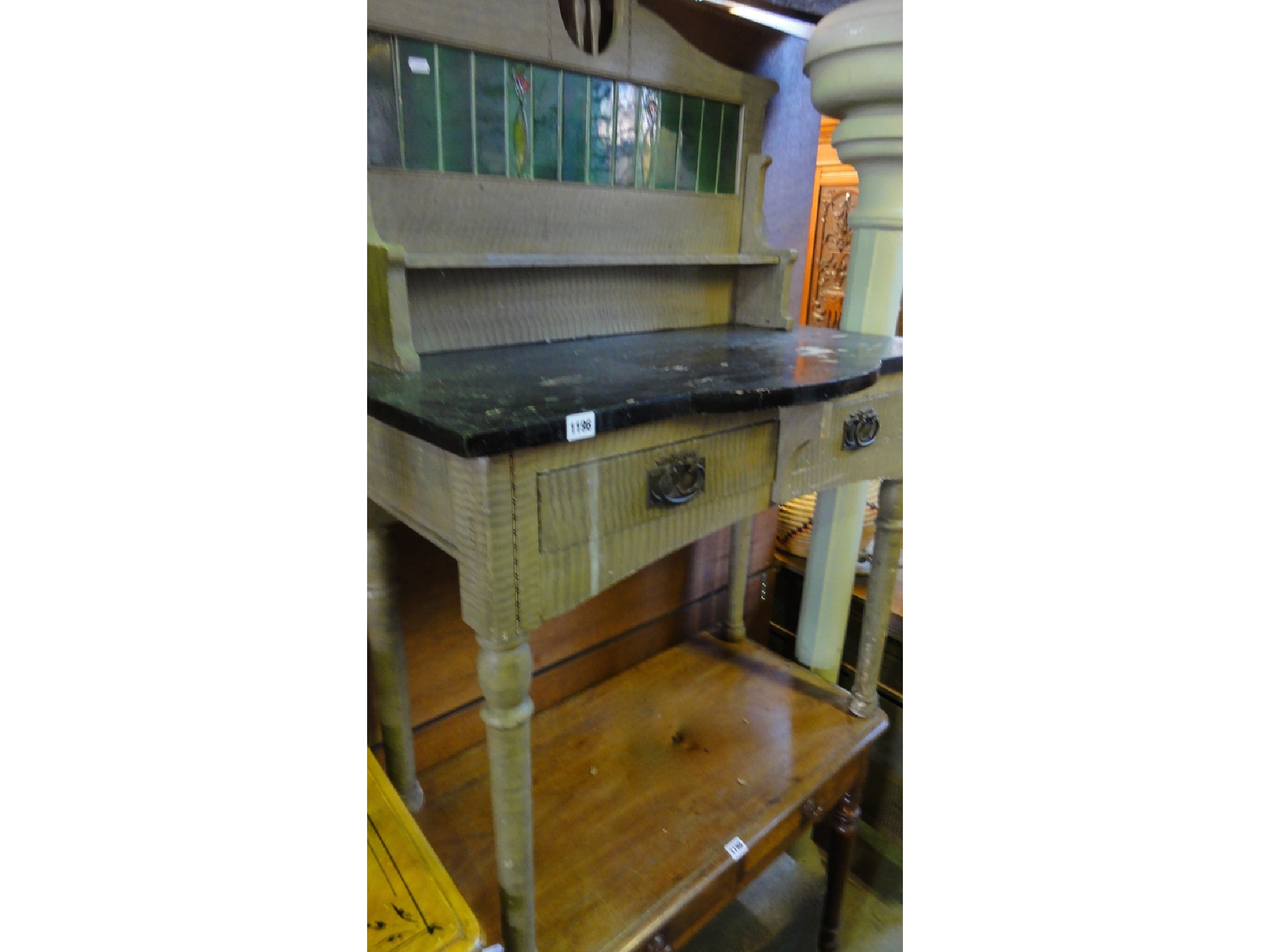 Appraisal: An Edwardian art nouveau crafts style pine wash stand with