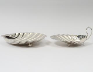 Appraisal: TWO STERLING SILVER SHELL-FORM DISHES American th Century One by