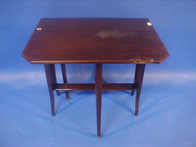 Appraisal: An Edwardian mahogany Sutherland table on square framing