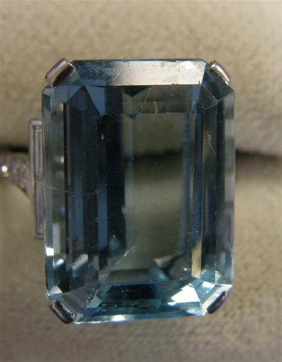 Appraisal: Aquamarine and diamond ring comprising a rectangular aquamarine flanked by