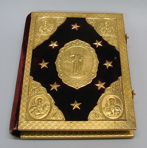 Appraisal: Gilt bronze mounts on cover Christ at center flanked by