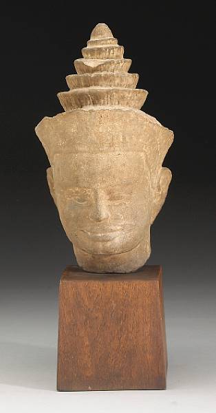 Appraisal: A Khmer stone head of a deity th Century His