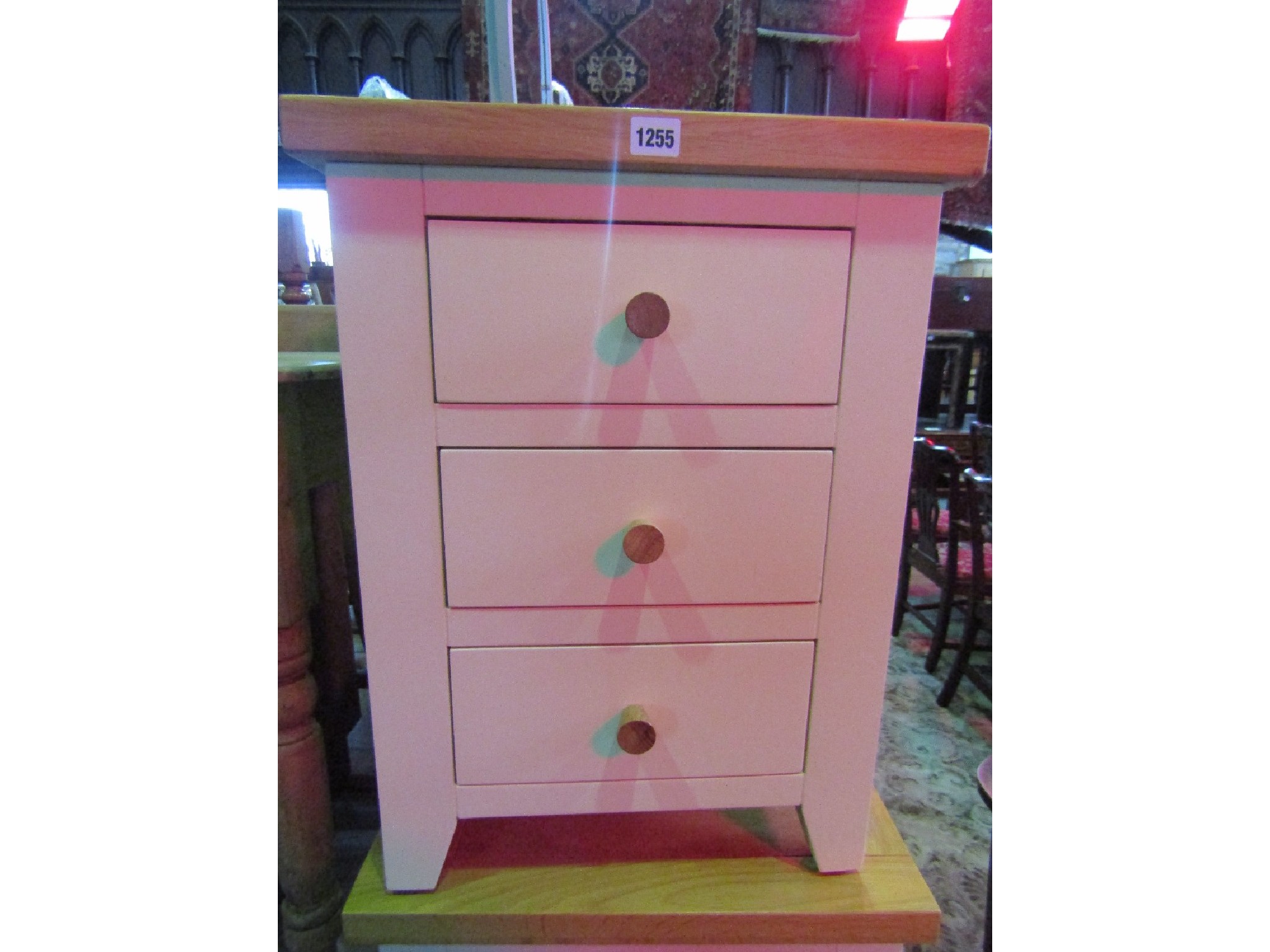 Appraisal: A contemporary cream painted upright chest of five long drawers