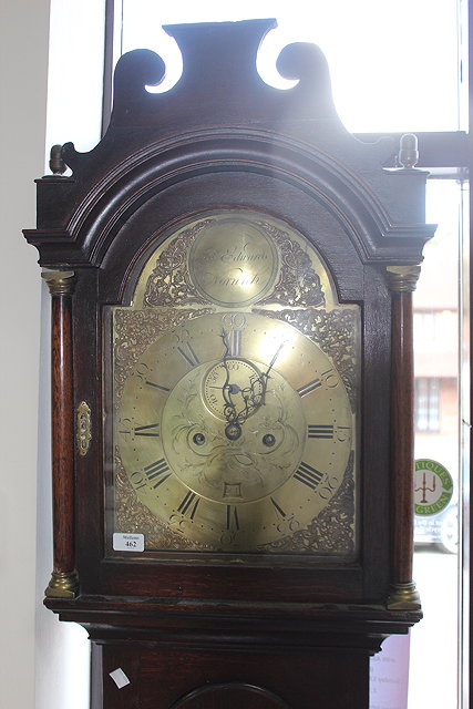 Appraisal: A GEORGIAN OAK LONGCASE CLOCK with arching hood the brass