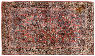 Appraisal: Sarouk rug floral designs on red field ft in x